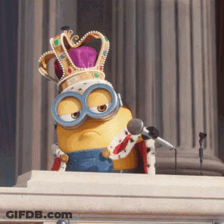 Minion Wearing Crown And Goggles Speaking GIF