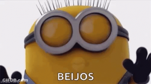 Minion Wearing Glasses Giving A Kiss GIF