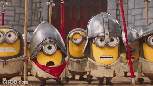 Minions In Armor And Helmets Lined Up GIF