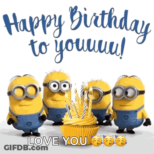 Minions Standing Around Cupcake With Candles GIF