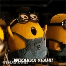 Minions Standing Together One With Goggles And Helmet GIF