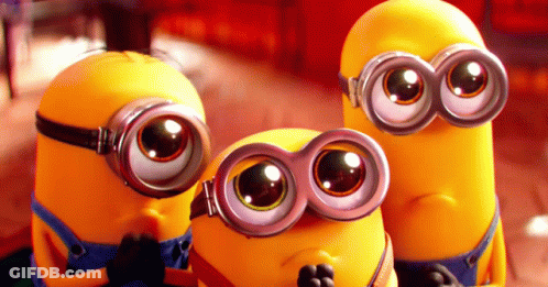 Minions Wearing Goggles And Bow Ties GIF