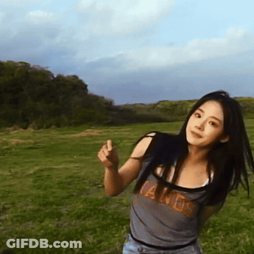 Minji Holding 4 Leaf Clover GIF