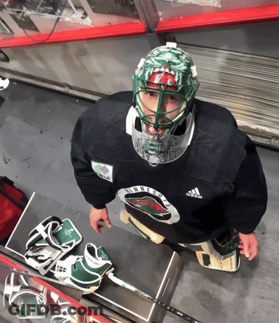 Minnesota Hockey Player Sitting On Ice GIF