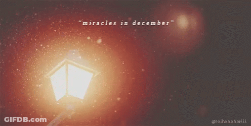 Miracles In December Sign With Lamp Post GIF