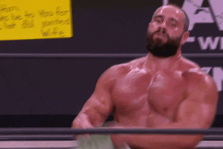 Miro Showing Off Championship Belt GIF