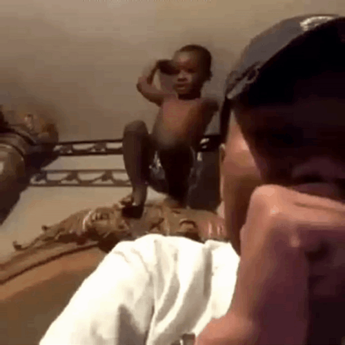 Mischievous Baby Acrobatic Jump Meme GIF