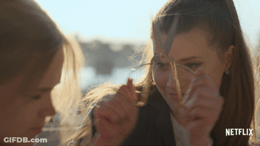 Mischievous Lade Playing With Scissors GIF