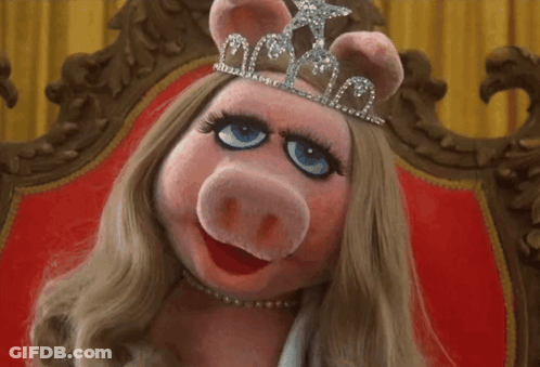 Miss Piggy Is Wearing A Tiara And A Necklace GIF