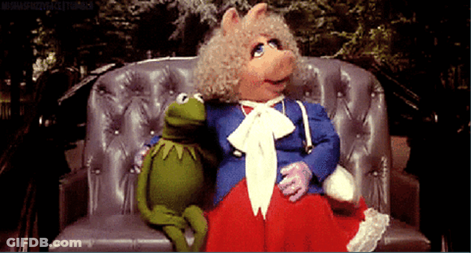 Miss Piggy Sits With Kermit GIF