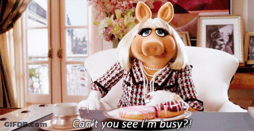Miss Piggy Sitting At Table With Food And Coffee GIF