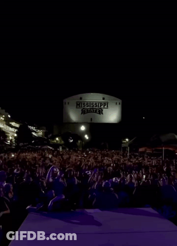 Mississippi State Sign Over Crowd At Night GIF
