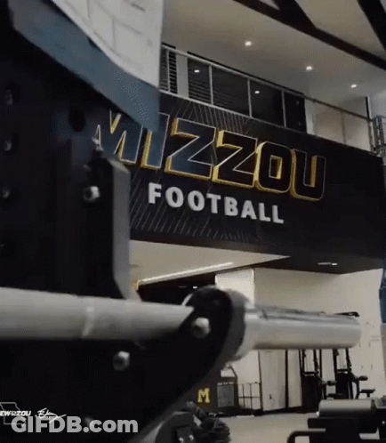 Mizzou Football Sign Hangs From Ceiling GIF