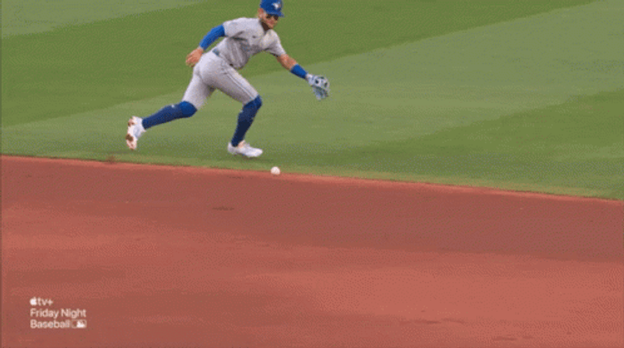 MLB Blue Jays Players Catching Baseball GIF