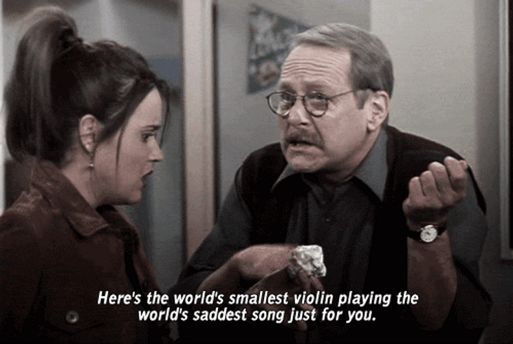 Mocking With Smallest Violin Response GIF