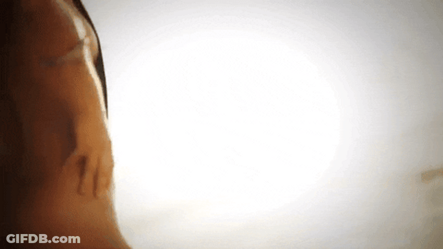 Model Wears Thong In Bright Sunlight GIF