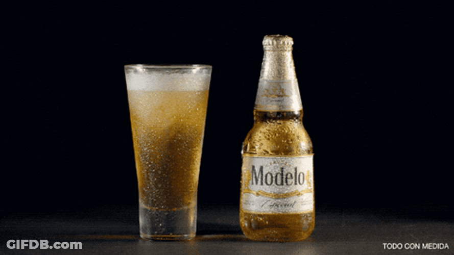 Modelo Beer Being Poured On Glass GIF