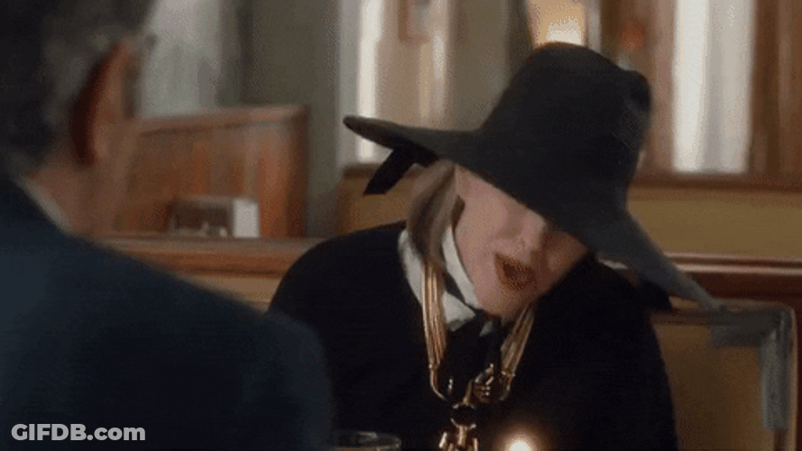 Moira Rose Blowing Candle GIF