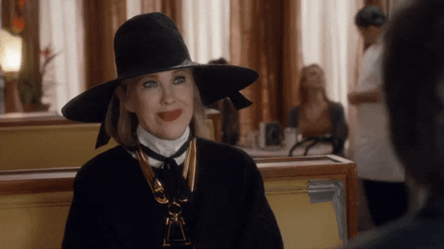 Moira Rose Looking Sideways GIF