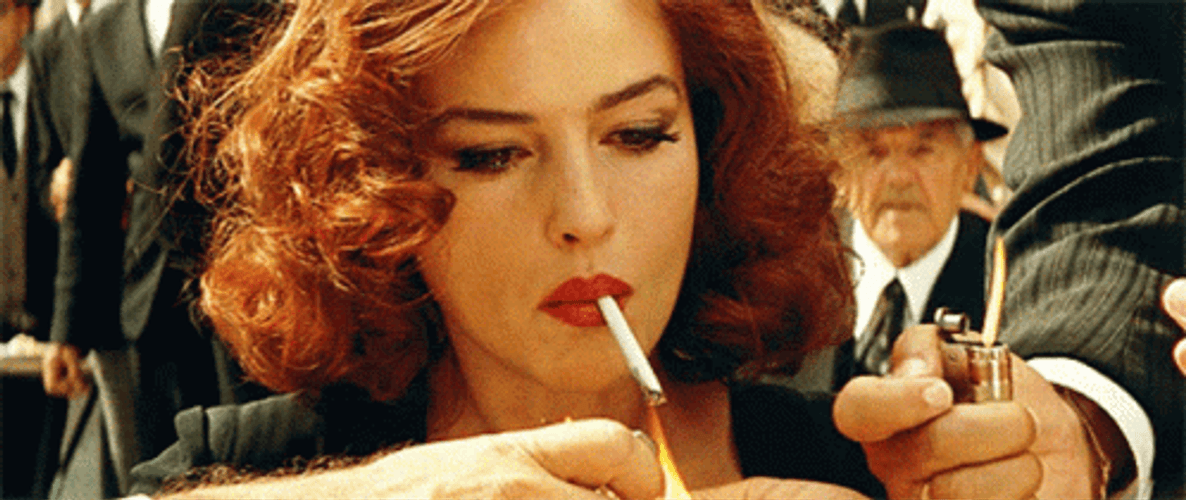Monica Bellucci Puffing Smoke GIF
