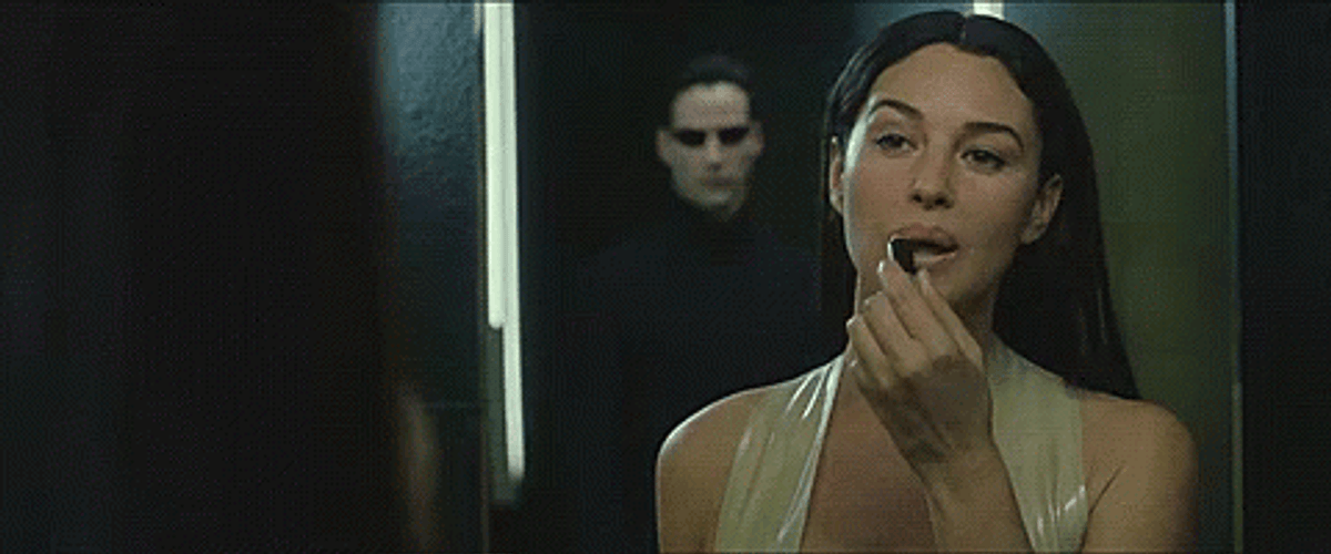 Monica Bellucci Putting Lipstick On GIF