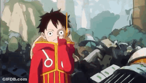Monkey D Luffy From One Piece Is Holding A Magnifying Glass In His Hand And Looking Through It . GIF
