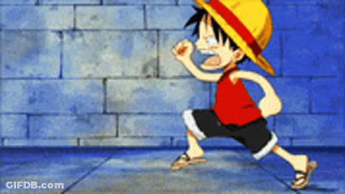 Monkey D Luffy From One Piece Is Running In Front Of A Blue Brick Wall GIF