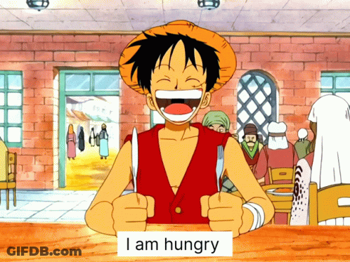 Monkey D Luffy Is Holding A Knife And Fork With A Sign That Says I Am Hungry GIF