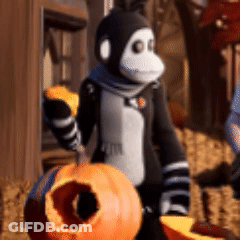 Monkey Holding Pumpkin With Hole GIF