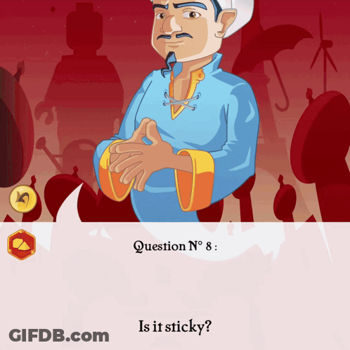 Monkey Holding Wallet In Mouth Sitting On Ground GIF