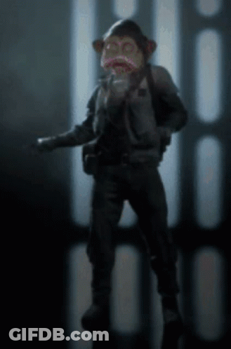 Monkey Wearing Mask In Dark Room GIF