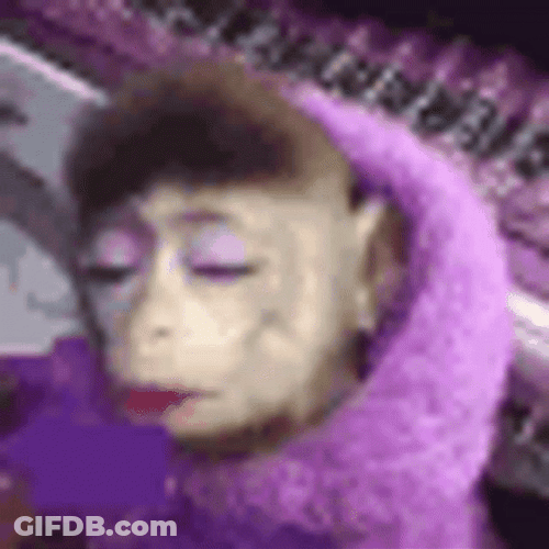 Monkey With Make Up And Long Eyelashes GIF