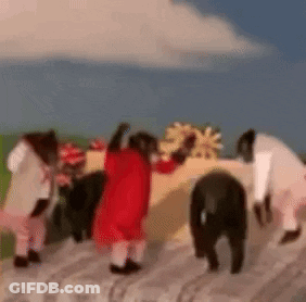 Monkeys Dressed As Santa Claus Standing On Log GIF