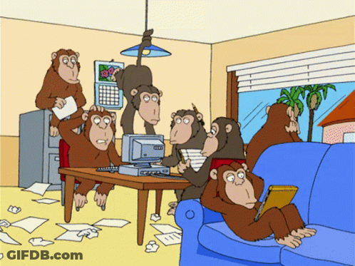 Monkeys Gathered Around Computer GIF