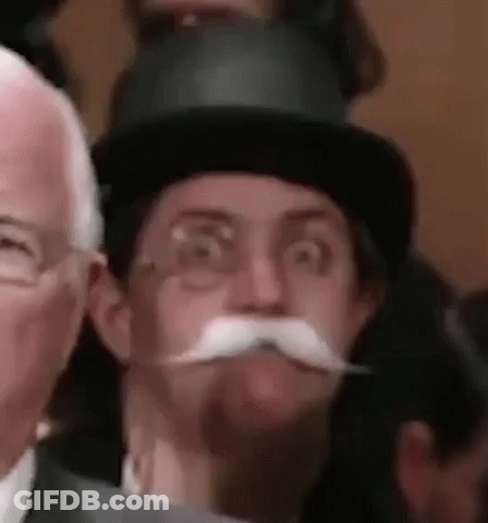 Monopoly Game With Man In Top Hat GIF