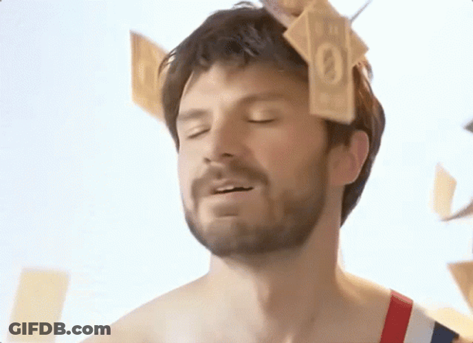 Monopoly Money Falling Above Man GIF