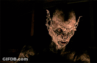 Monster Face With Red Eyes GIF