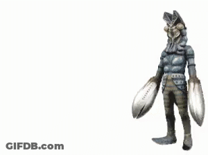 Monster Holding Large Claw With Letter T GIF