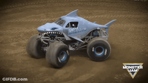 Monster Jam Shark Truck Driving In Dirt GIF