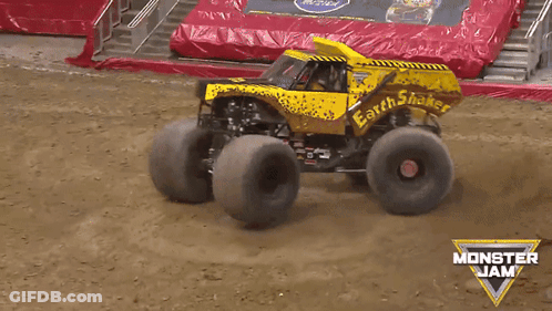 Monster Jam Truck Driving On Dirt Road GIF