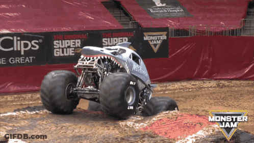 Monster Jam Truck Driving Through Mud GIF