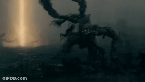 Monster Standing In Dark With Light Beam GIF