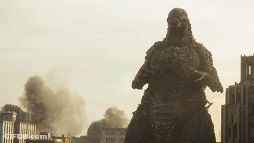 Monster Statue In City With Smoke GIF