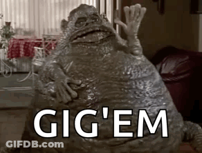 Monster Statue With Gig 'Em In Living Room GIF
