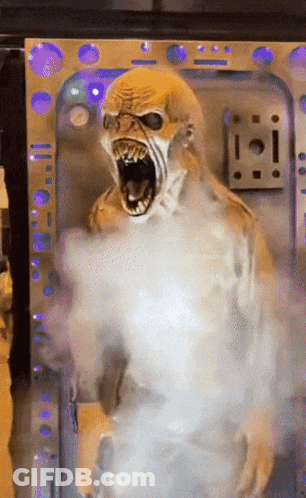 Monster Statue With Open Mouth And Smoke GIF