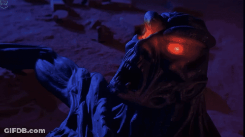 Monster Statue With Red Eyes And R GIF