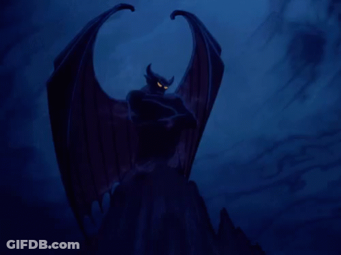 Monster Statue With Wings And Horns On Mountain GIF