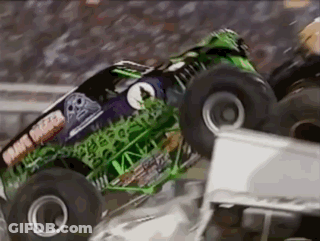 Monster Truck Grave Digger Crashing Into White Truck GIF