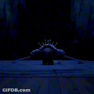 Monster With Crown Of Bones On Blue Surface GIF