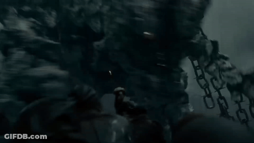 Monster With Huge Head And Arms In Dark GIF